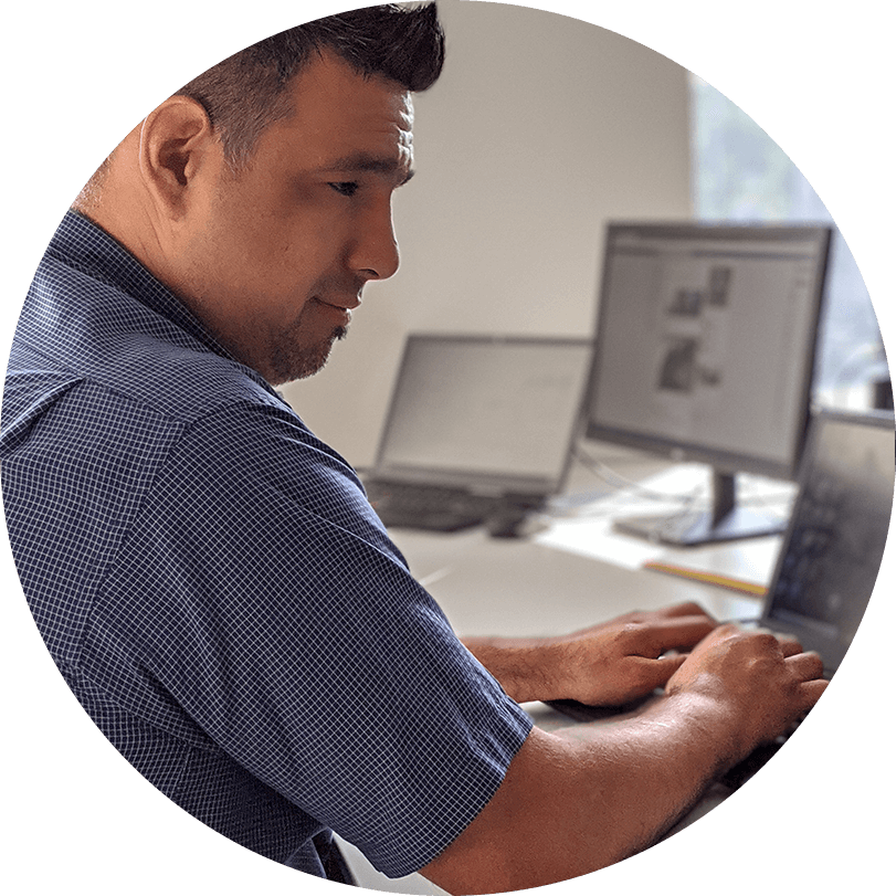 A person working on a laptop.