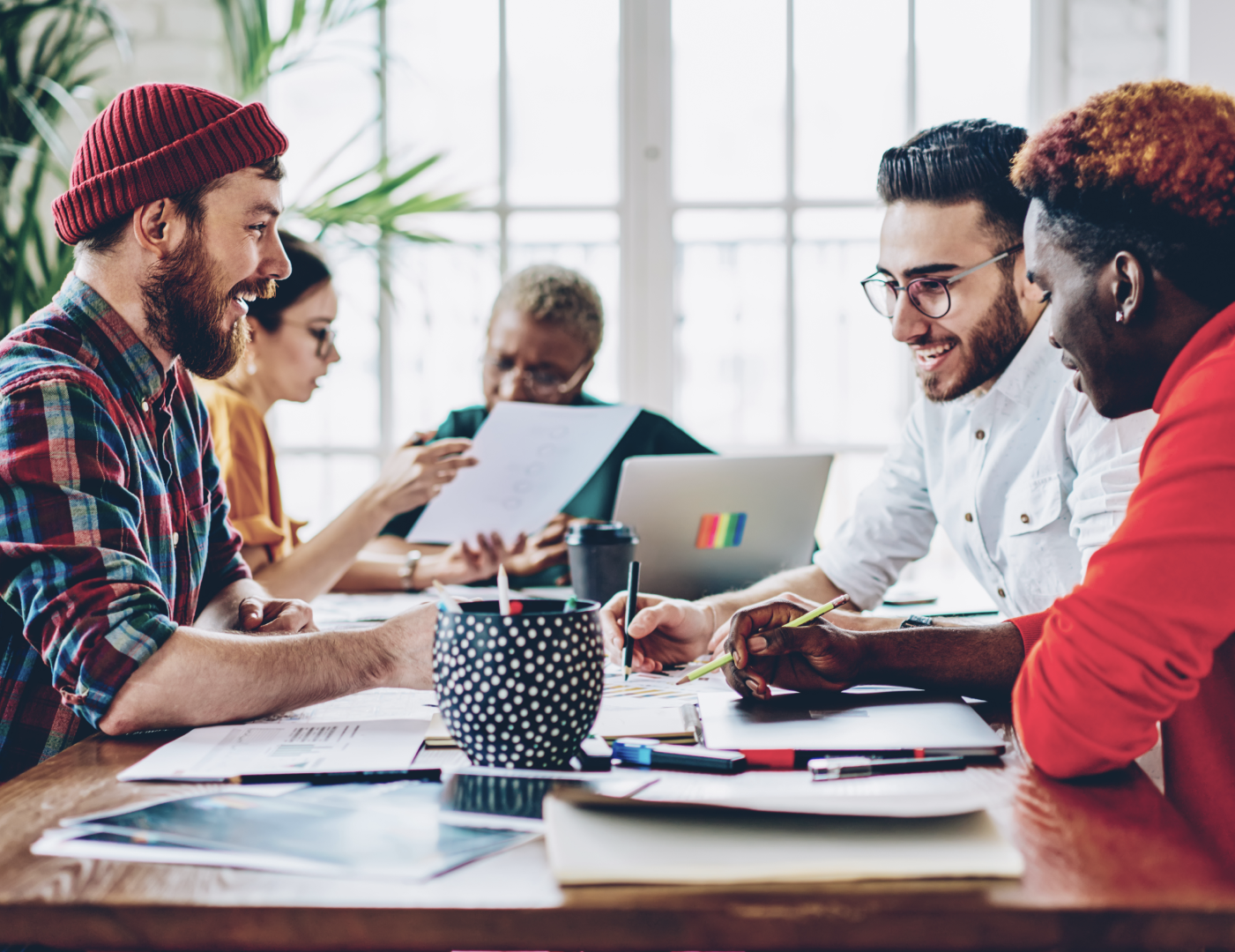 Group of people working together at a table