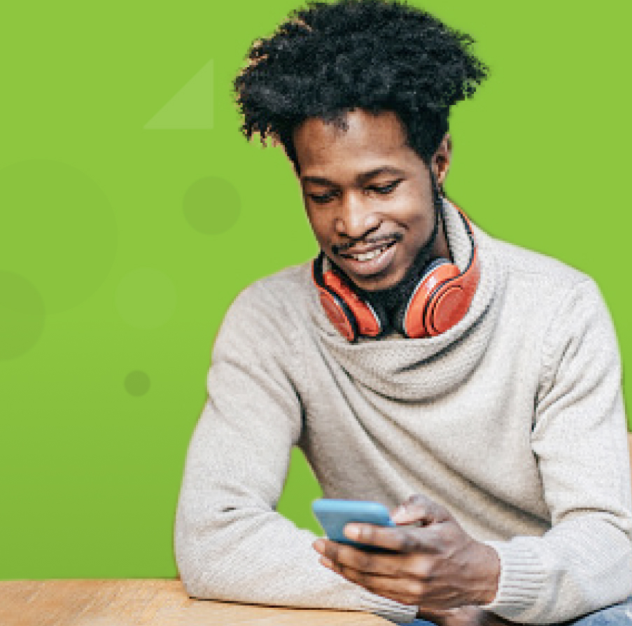 Seated person looking at phone