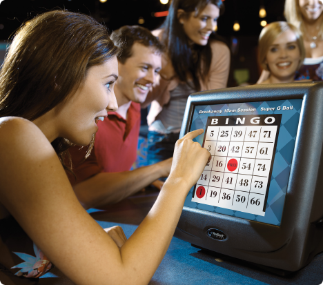 Close up of a person playing bingo on a screen monitor.