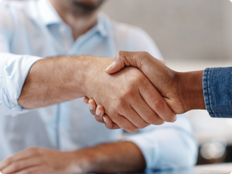 Close up of a handshake.