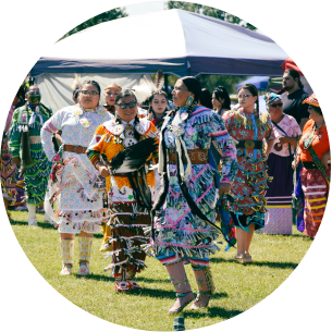 View of people wearing multi-coloured attire.