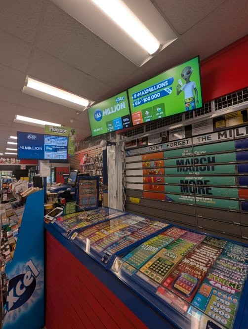 OLG authorized Retailer with Lottery Ticket Counter and In-store Display